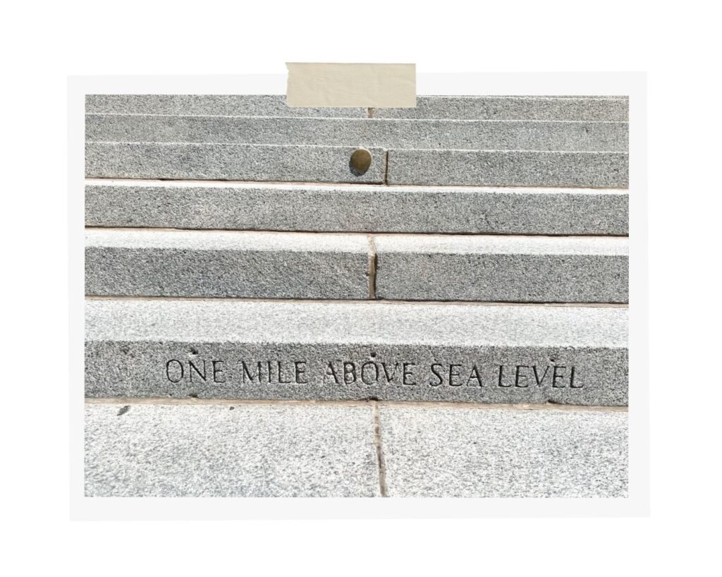 one mile high step marker on the west side of the Colorado State Capitol Building