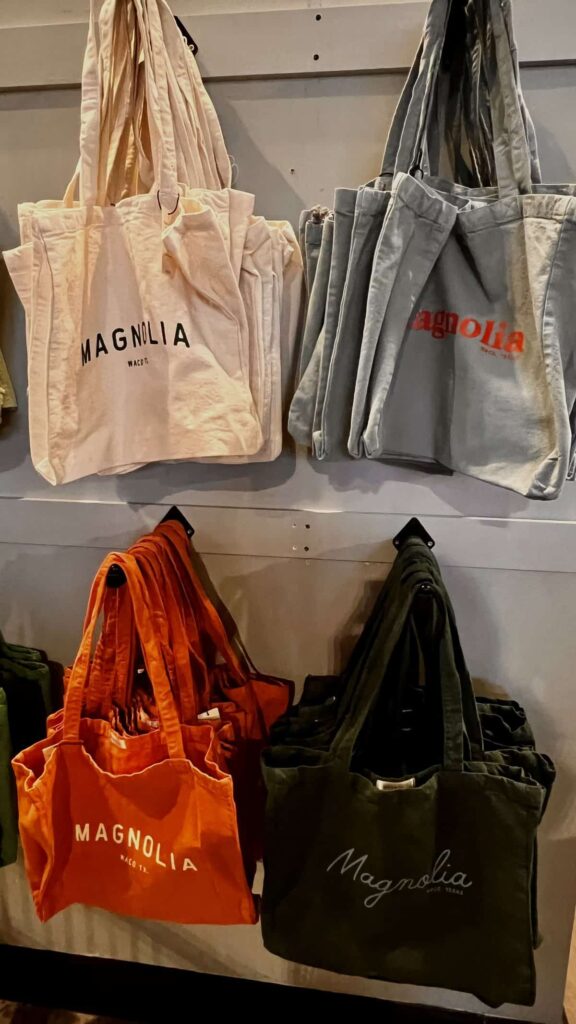 tote bags hanging on display