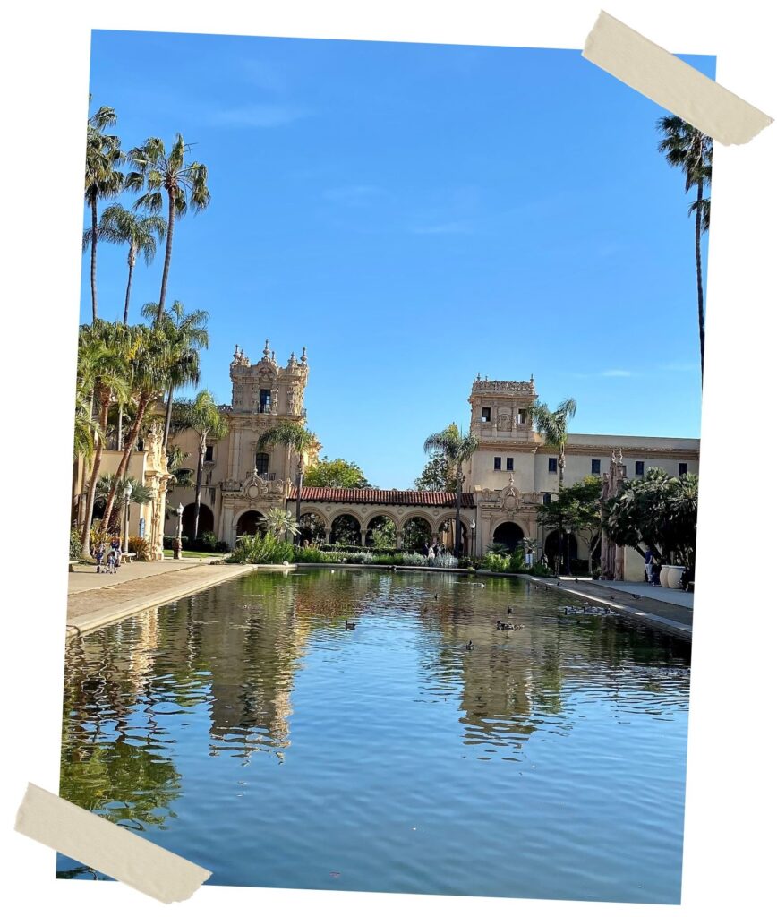 SPANISH INSPIRED BUILDING WITH A POND IN FRONT